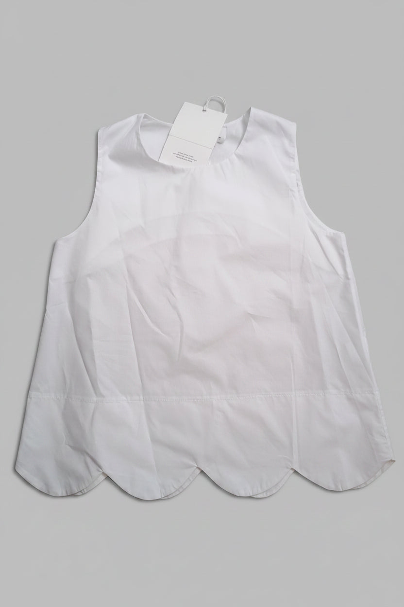 Blusa Smanicata con Taglio a Onde